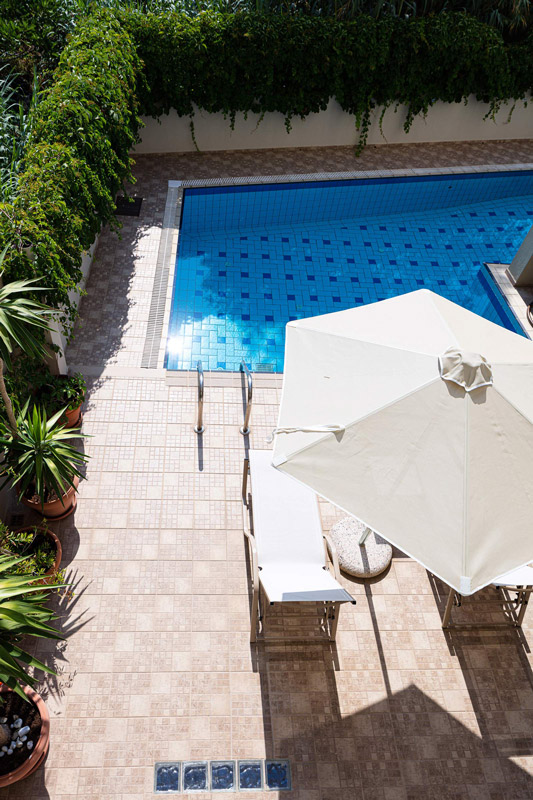Batis hotel pool and sunbeds